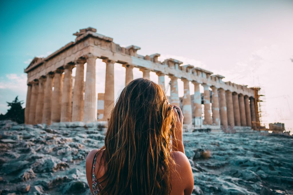 Athens Private Tours – Best Places to Visit Woman is taking a photo of the Parthenon, Athens Private Tours - Best Places to Visit